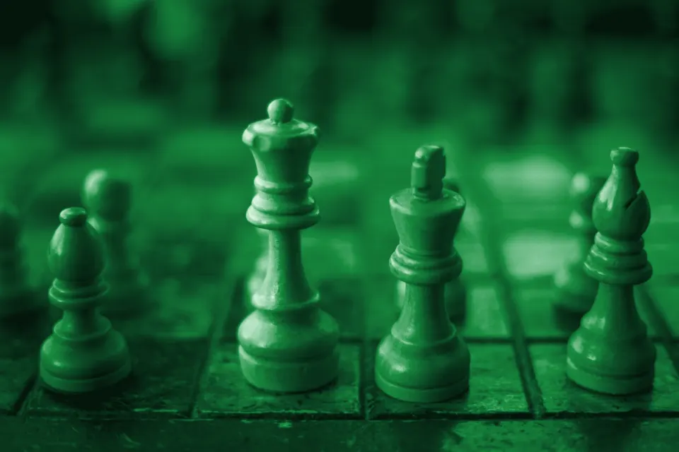 Wooden chess pieces on a board